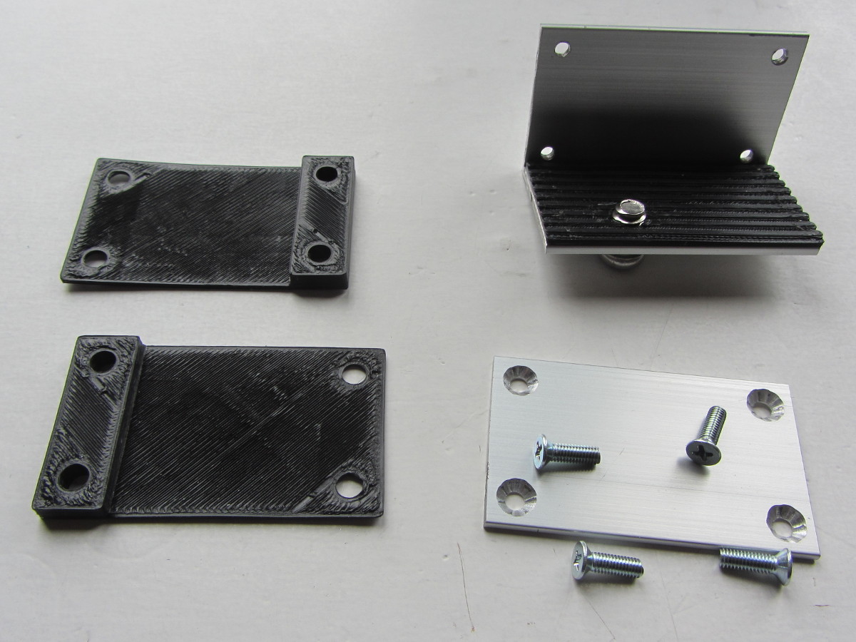 Parts of the camera mount, aluminium strip and profile with holes, screws and 3D-printed padding